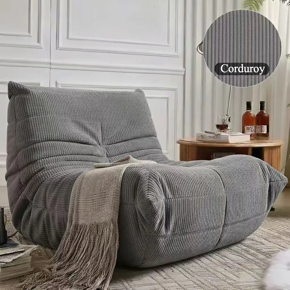 Rounded low profile lounge module for relaxed seating